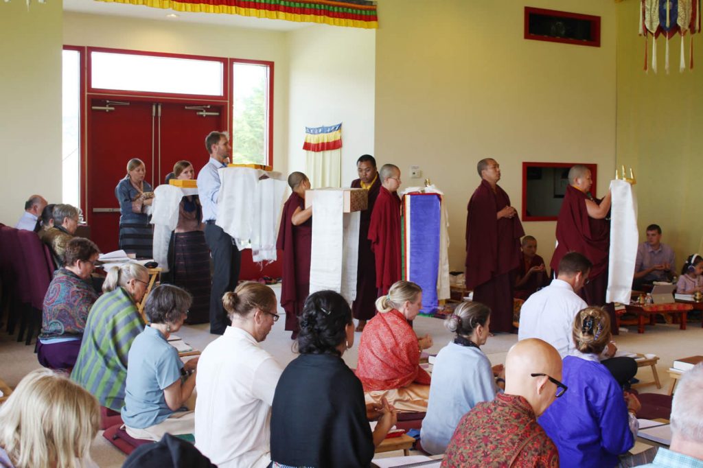Offerings are made to His Eminence Dzigar Kongtrul Rinpoche at the conclusion of the teachings