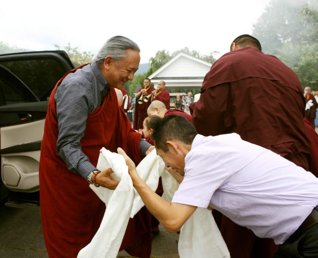 H.E. Dzigar Kongtrul Rinpoche is welcomed by Dr. Tsewang Rigzin