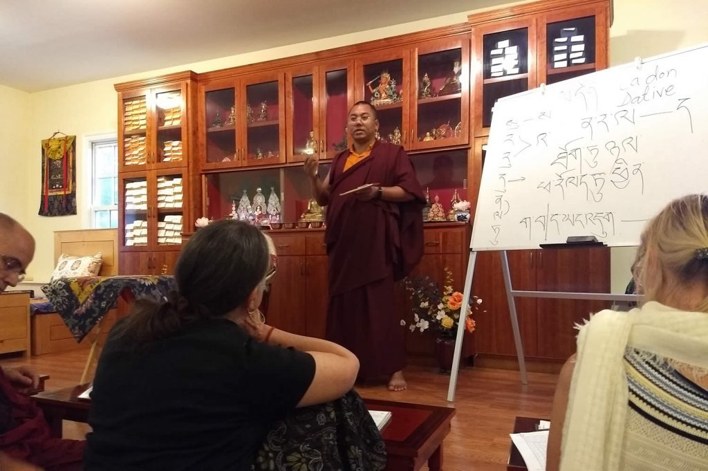 Ven. Khenpo Namdrol Gyatso la with students during Tibetan grammar class