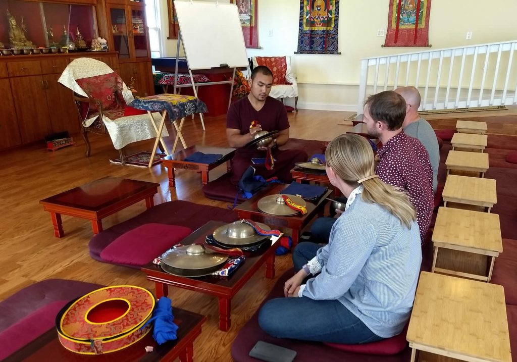 Ven. Choktrul Ngawang Jigdral Rinpoche teaching the<em> rolmo</em> and <em>silnyen</em>