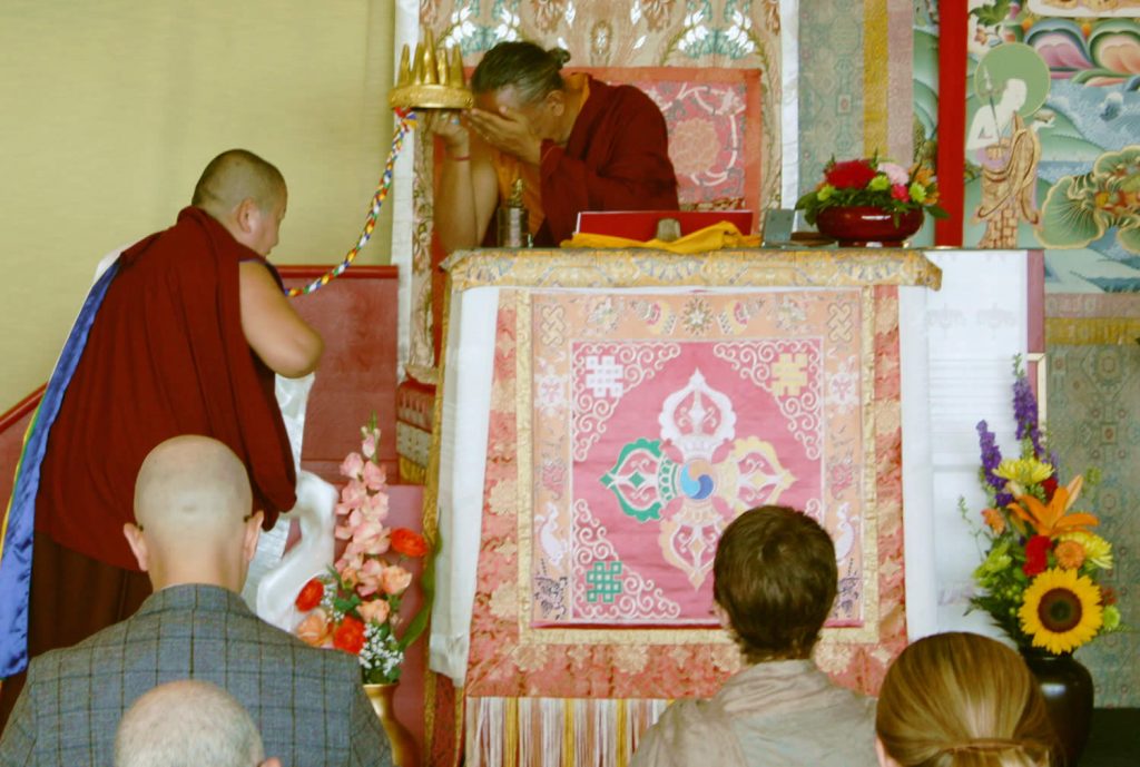 H.E. Jetsün Khandro Rinpoche makes the mandala offering