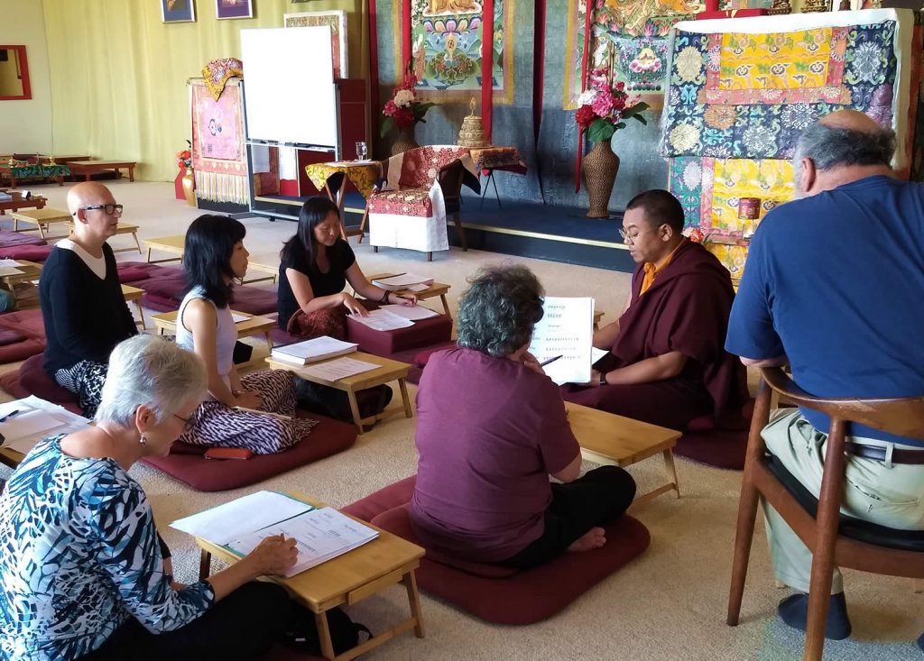 Ven. Khenpo Namdrol Gyatso la leads a Tibetan language reading class