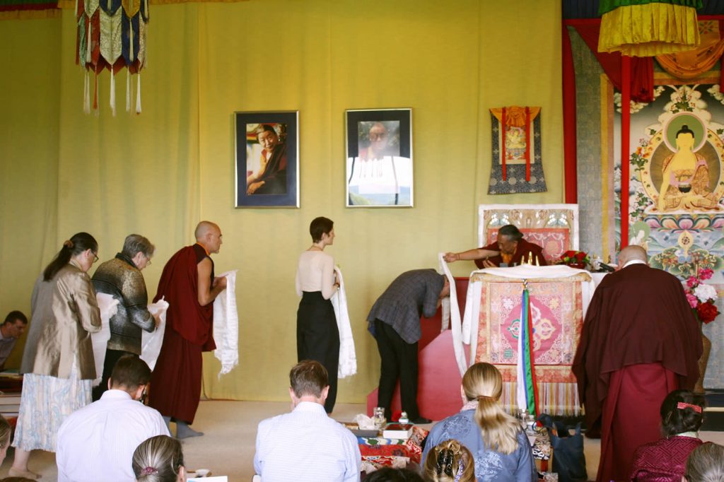 Offering khatags to H.E. Dzigar Kongtrul Rinpoche