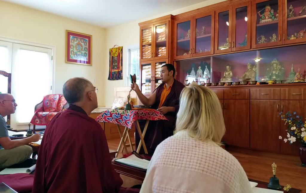 Ven. Choktrul Ngawang Jigdral Rinpoche and students review the Vajrasattva (Minling Dorsem) liturgy